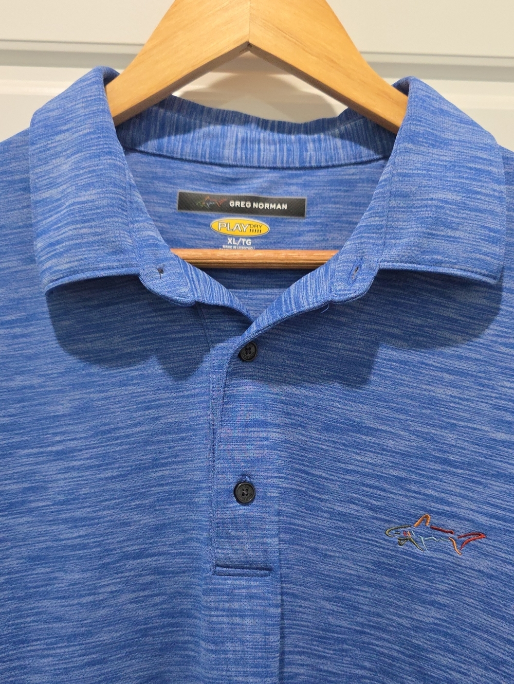 Greg Norman Collection Heathered Blue Polo Shirt with Embroidered Shark